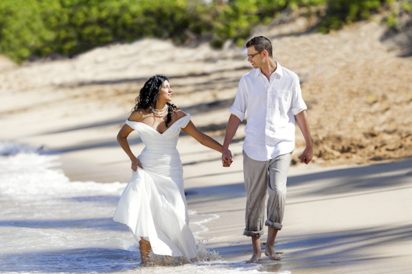 the newlywed walking on the beach - wedding photo by top Denver based wedding photographer Hardy Klahold
